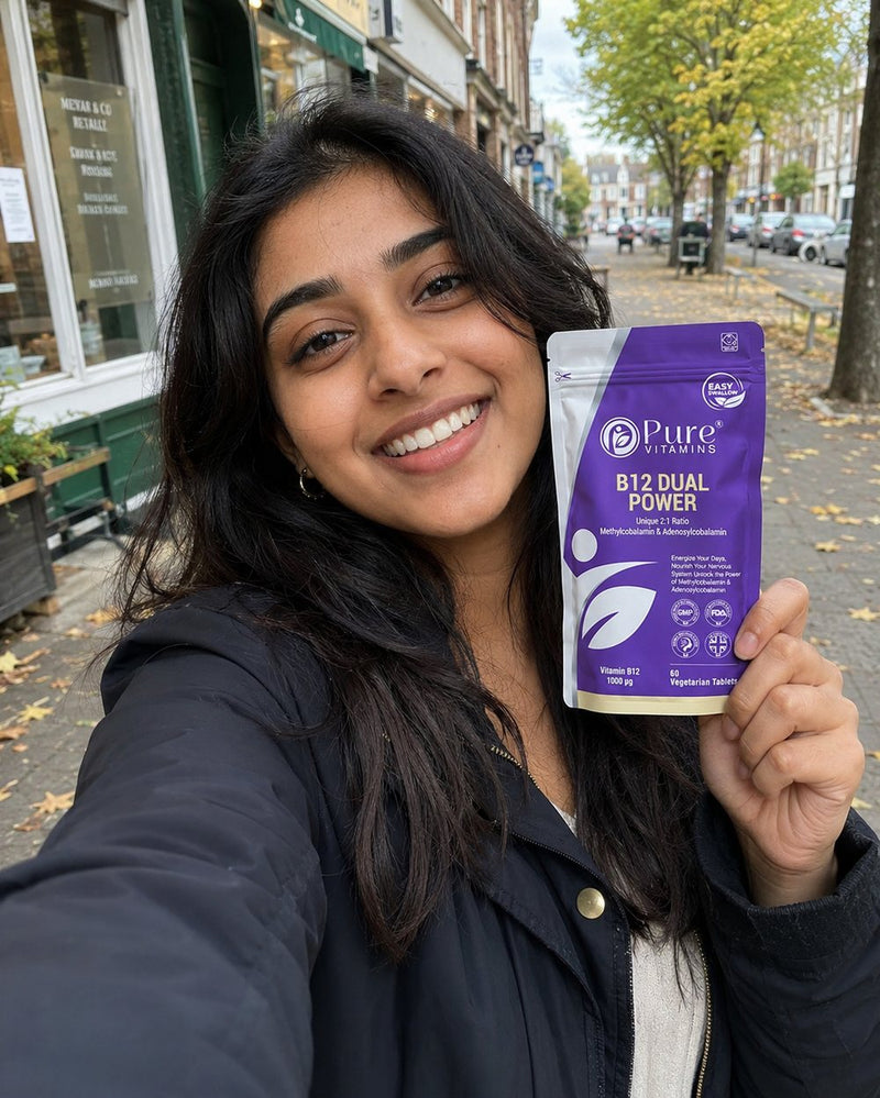 Customer holding a pouch of Pure Vitamins B12 Dual Power