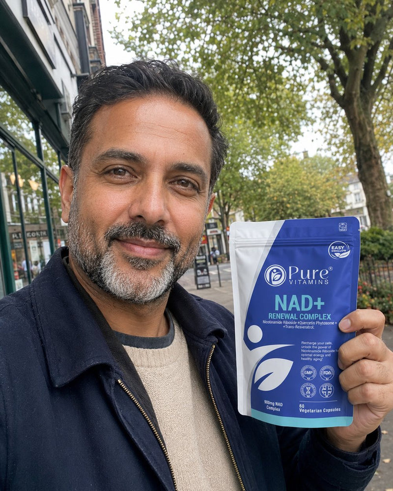 Customer holding a pouch of Pure Vitamins NAD+ Renewal Complex