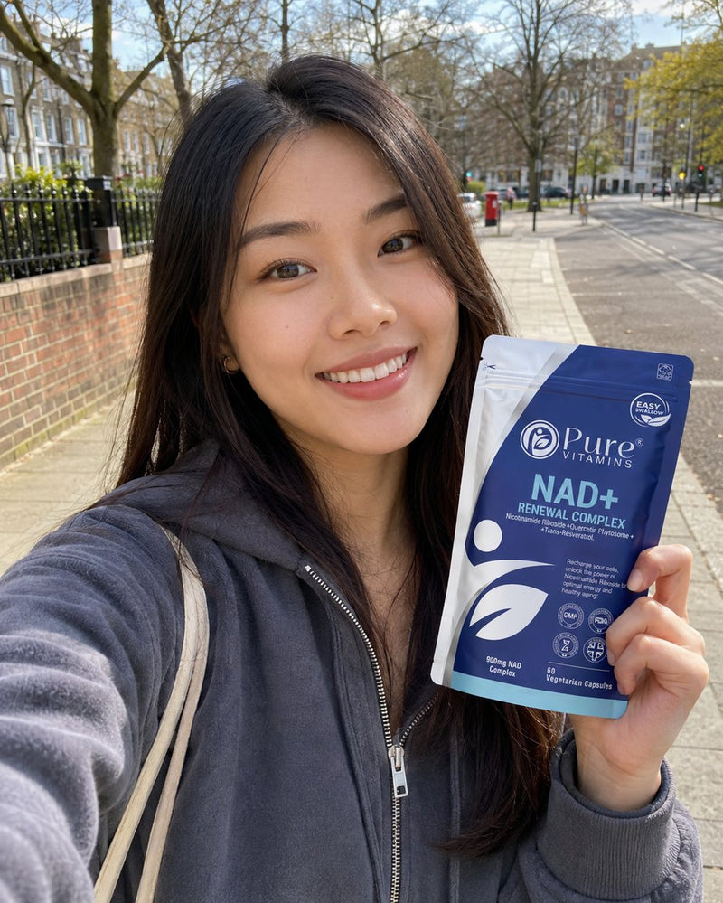Customer holding a pouch of Pure Vitamins NAD+ Renewal Complex