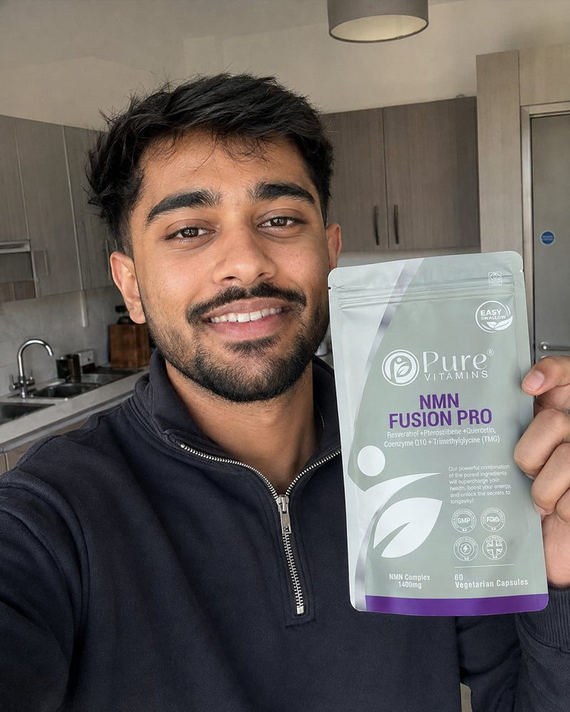 Customer holding a pouch of Pure Vitamins NMN Fusion Pro